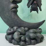 Bat and moon half crescent moon hanging vampire bat